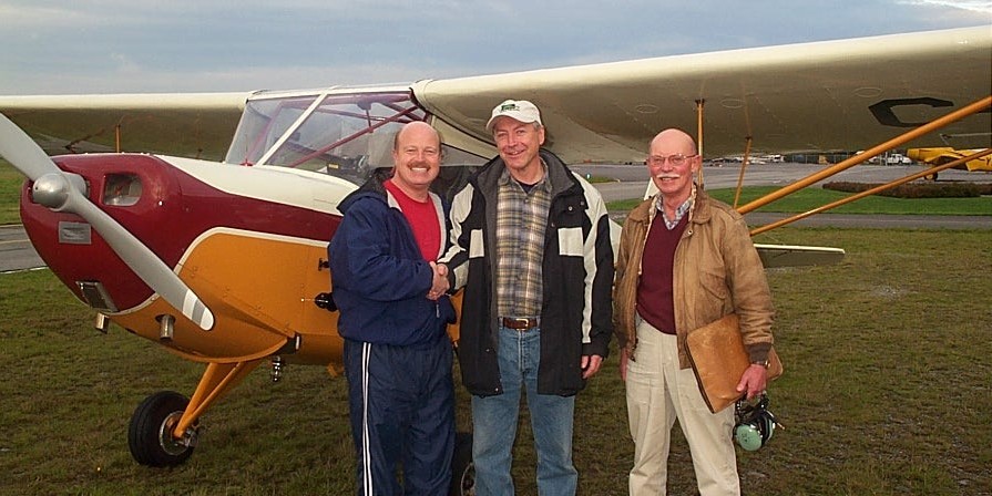 David Parry, Lloyd Blackburn, and Donn Richardson following Lloyd's Private Pilot Flight Test.  Langley Flying School.